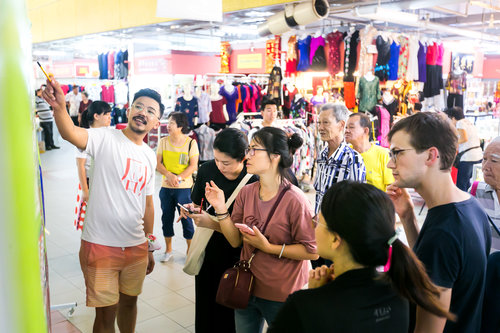 Passerbys sharing their insights on Chinatown during our public engagement activity