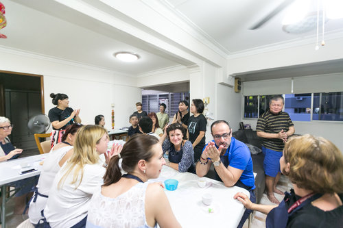 Celebrating a successful bao-making session with participants at the Flavours of Chinatown workshop